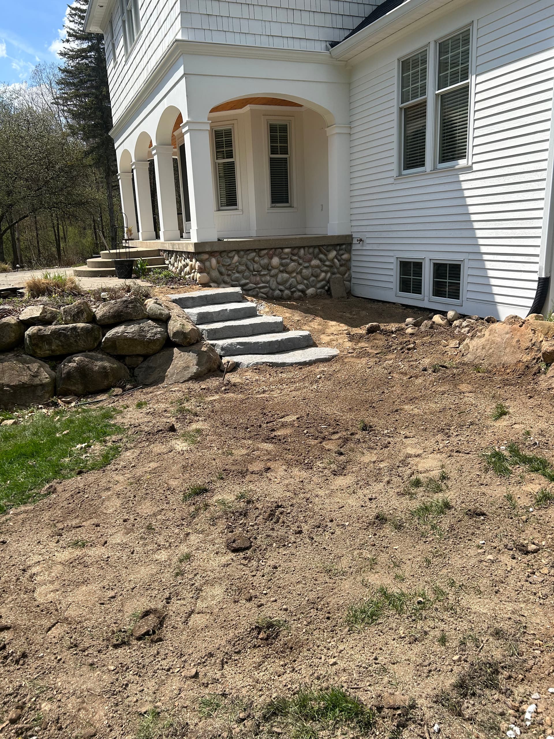 Large-Format Stone Steps Built for Patio Access and Flow image