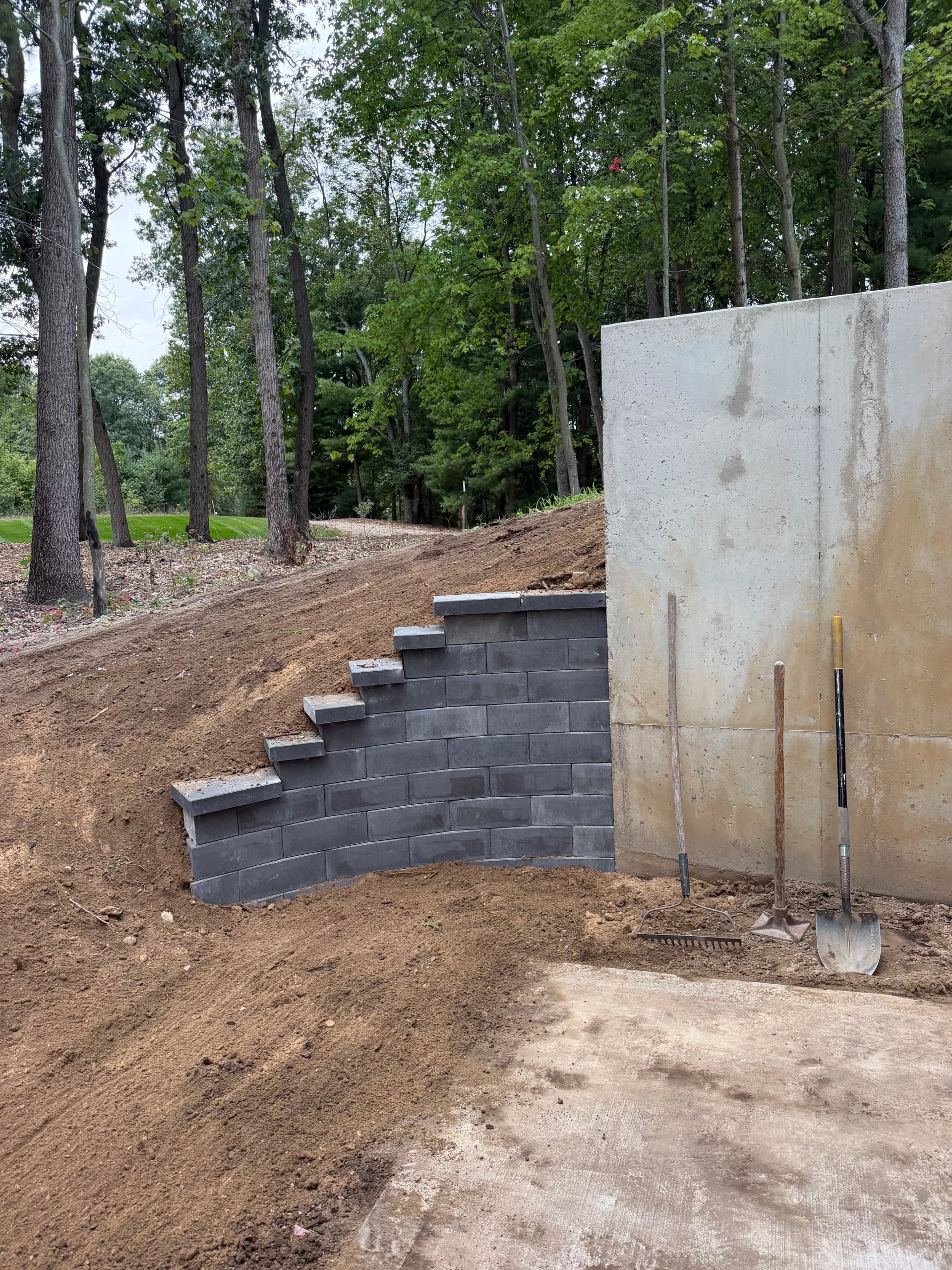 Gallery photos for One-Day Retaining Wall Build Using Unilock Pisa Smooth Block: Image #1