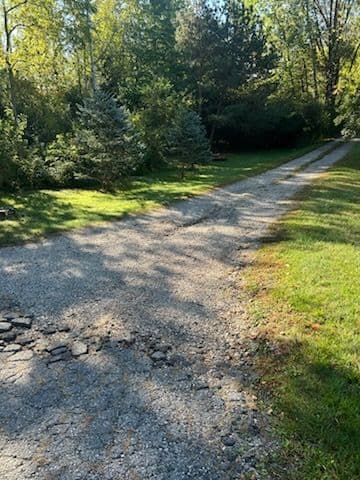 Crushed Asphalt Driveway Transformation