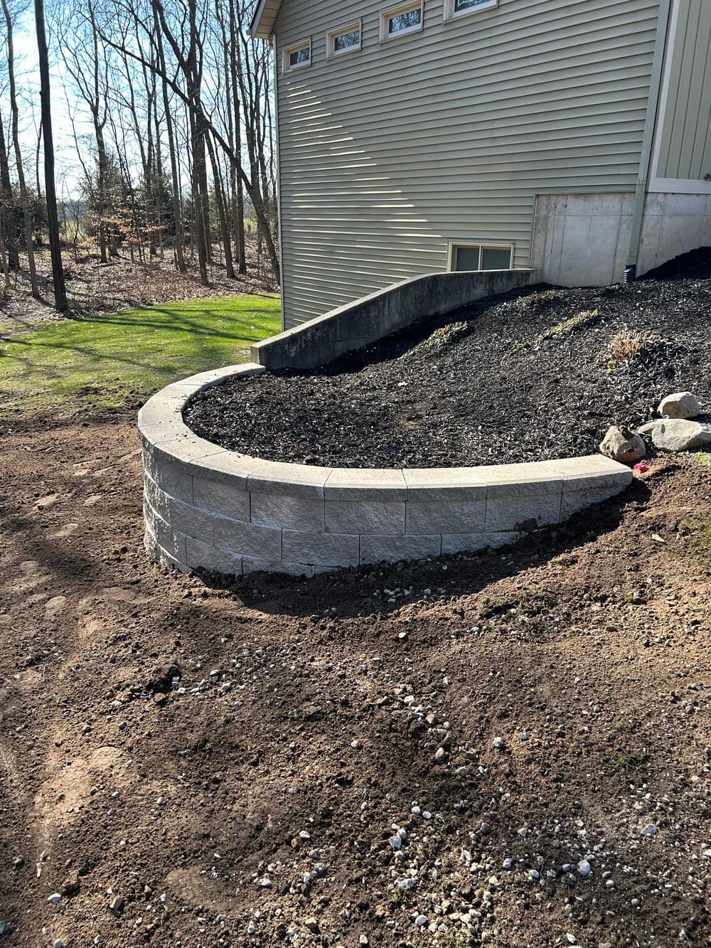 Gallery photos for Fresh Block Retaining Wall Built to Hold the Hill: Image #1