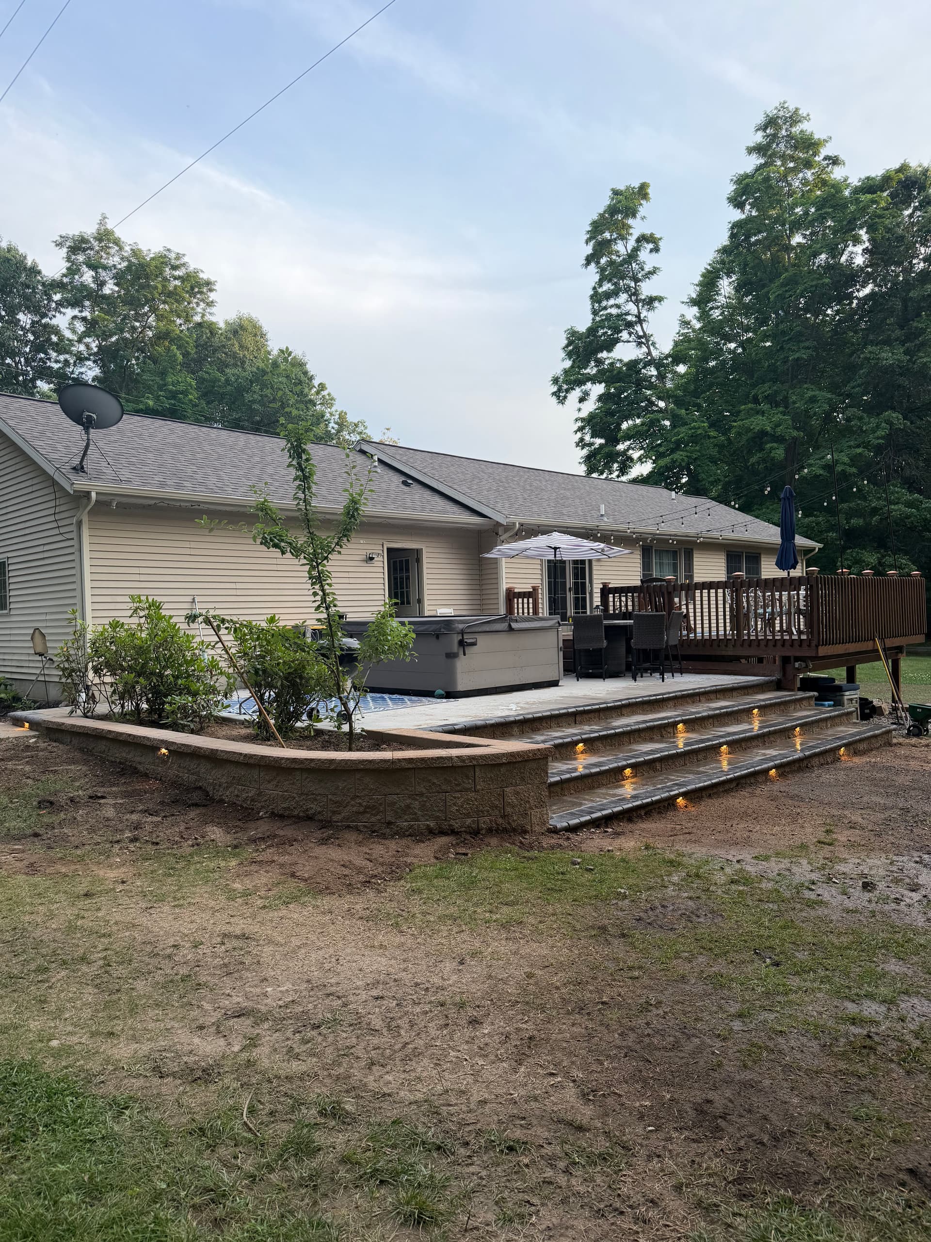 New Patio Steps and Retaining Wall Give This Backyard a Sharp Finished Look image